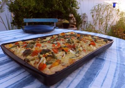 Vegetable Quiche on our outside table with the garden in the background