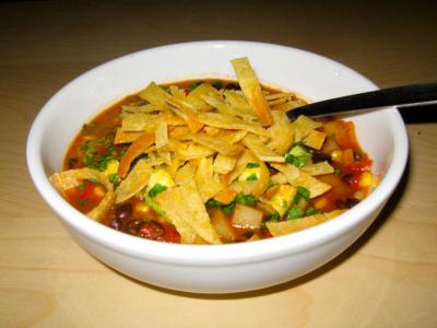 Vegan/Vegetarian Tortilla Soup in white bowl