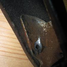 rivet after grinding off flared end