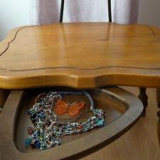 The Butler Chair has a little, secret compartment under the seat which swings out and is perfect for stashing away jewelry or other small items. the butler chair has a secret compartment