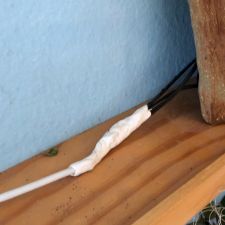 The ugly Sugru encasing of the new wire junction. Functional and very durable. If it were exposed I'd have worked much harder, shaping and smoothing it into a nice sleek lump. sugru-encased wire junction