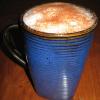 Chai Latte topped with ground cinnamon and cocoa powder
